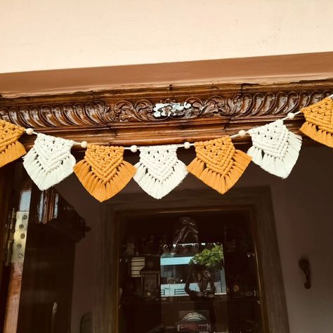 Drape your doorway in charm and tradition with stunning macramé torans.✳️✨ DM for any queries 💌 #macramemagic #homestyle #macrame #handcrafted #handcraftedwithlove #handmadewithlove #handmadedecor #handcraftedbeauty #handcraftedcoasters #macramemagic #handmade #decor #handcraftedelegance #macrame #instapost #macrameart #artisticjourney #handcrafteddelights #newbeginnings #gratefulheart #macramê #macrameartist #macramedesign Macrame Toran, Handmade Decor, Diy Crafts Hacks, Macrame Art, Crafts Hacks, Grateful Heart, Macrame Design, Macrame Patterns, May 23