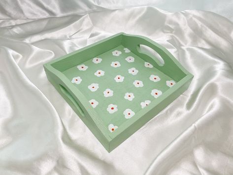 "See more items from my Danish Pastel Collection: https://etsy.me/3lAE93O See all my items: https://www.etsy.com/shop/sugarpillstudios/ Handcrafted wooden tray. Painted by hand with acrylic & tempura paints. Then it is air-dried and glazed with an acrylic finish to lock in color and seal. Each piece is one of a kind. No piece is perfect and there may be small imperfections. Approximate size: 6\"L x6\" W x 1.75\"H *PLEASE NOTE* Every piece is made to order by hand. Products may differ slightly i Danish Pastel Decor, Bathroom Vanity Tray, Pastel Home Decor, Tray Coffee Table, Catchall Tray, Painted Trays, Paint Tray, Green Pastel, Perfume Tray