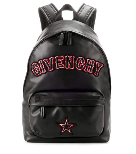 GIVENCHY - Leather backpack - Givenchy elevates your off-duty style with this black leather backpack featuring red and black appliqués reading the label's name and signature star on the front. Carry your essentials in this ultra-cool style on urban days. - @ www.mytheresa.com Givenchy Backpack, Backpacks Black, Knapsack Bag, Givenchy Bags, Givenchy Handbags, Classy Clothes, Designer Leather Handbags, Real Leather Bags, Givenchy Bag