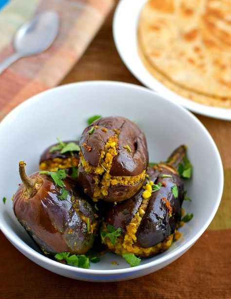 Bharva Baingan - Brinjal or eggplant stuffed with a spicy peanut and gram flour filling is no ordinary dish. It will tingle your taste buds in a way that you will keep craving for it. Thankfully you can make them in 30 minutes! Eggplants Recipe, Stuffed Eggplant, Eggplant Recipe, Healthy Indian Recipes, Eggplant Dishes, Ethnic Food, Eggplant Recipes, Indian Food Recipes Vegetarian, Indian Cooking