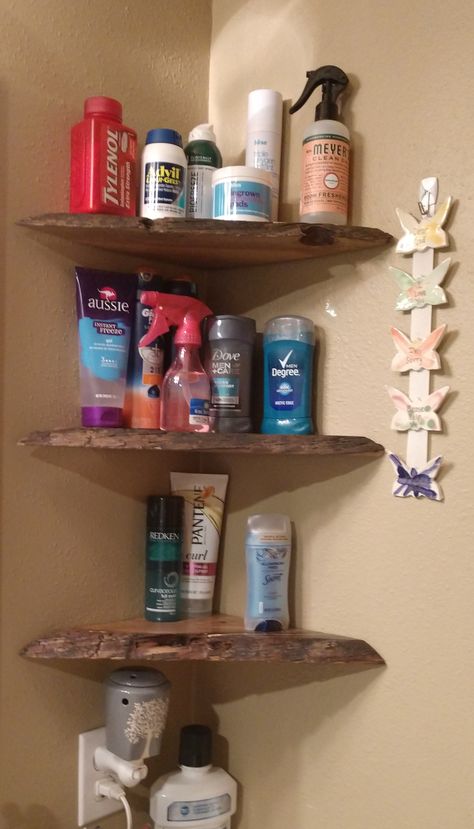 To create a little extra space in a small bathroom, add a few corner shelves. This can free up counter space. These ones were done with live edge wood, which look great and provide the space needed. Bathroom Counter Corner Shelf, Corner Shelf Ideas Bathroom, Live Edge Corner Shelves, Corner Bathroom Shelves, Bathroom Closet Shelving, Corner Shelves Bathroom, Bathroom Counter Shelf, Bathroom Corner Shelves, Bnb Decor