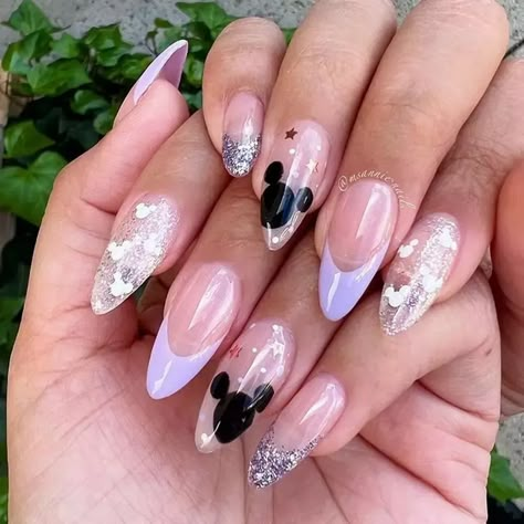 Garden Party Glam: Lavender Nail Art for Special Occasions #glaminati #nails #nailart #naildesigns #frenchnails #coffinnails #almondnails #ombrenails #gelnails #acrylicnails #trendynails #fallnails #purplenails #lavendernails #lilacnails #lavendercolor #lavenderpolishblands Glitter Disney Nails, Mickey Mouse Nail Design, Disney Themed Nails, Disney Christmas Nails, Disney Princess Nails, Disneyland Nails, Mouse Nails, Disney Nail Designs, Mickey Mouse Nails