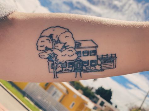 Fine line tattoo of house with front yard and tree on forearm Childhood House Tattoo, Childhood Home Tattoo Ideas, Fine Line House Tattoo, Table Tattoo Design, House Outline Tattoo, Childhood Home Tattoo, Address Tattoo, Cottage Tattoo, Small House Tattoo