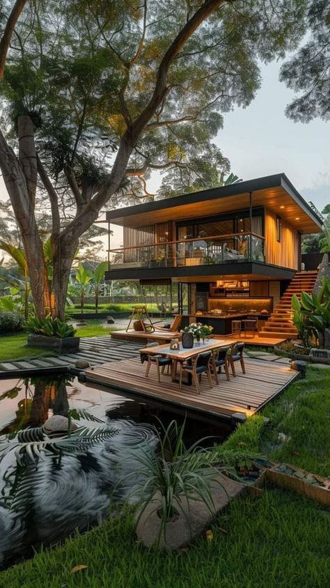 https://decomagz.com/20-modern-tiny-house-designs-that-redefine-compact-living/ Tropical Wood House, Forest Bungalow, Jungle Homes, Tropical House Design, Tiny House Designs, Rest House, Architect Design House, Modern Tiny House, Unique Beach