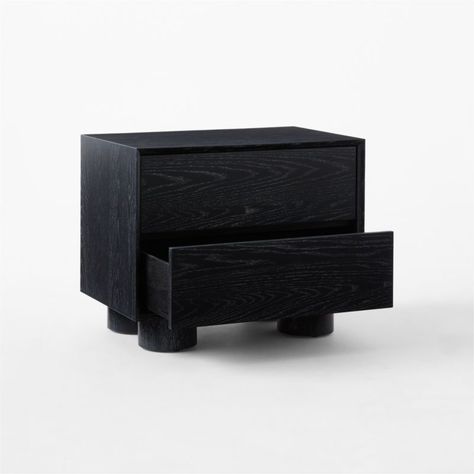 Low nightstand by Jannis Ellenberger has a straightforward profile and well-considered details. Thick cylindrical legs support a frame of black cerused oak, while two push-to-open drawers and a beveled edge enhance the sleekness. CB2 exclusive.  -Designed by Jannis Ellenberger -Wood and engineered wood -Metal hardware -Made in Vietnam Cantar Cerused Black Oak Nightstand Low Nightstand, Curved Nightstand, Oak Nightstand, Cerused Oak, Wooden Nightstand, Black Curves, Leg Support, Beveled Edge, A Frame