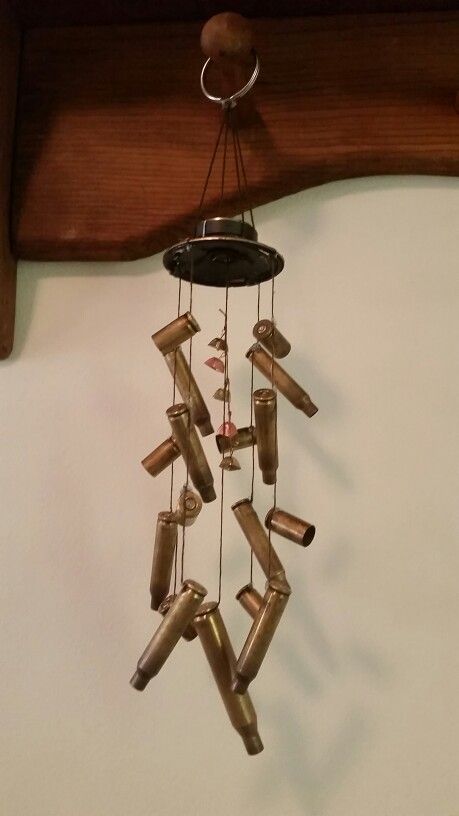 Bullet casing windchime Shell Casings Crafts, Bullet Casing Crafts, Shotgun Shell Crafts, Hunting Crafts, Bullet Casing Jewelry, Bullet Crafts, Deer Hunting Tips, Bullet Art, Game Hunting