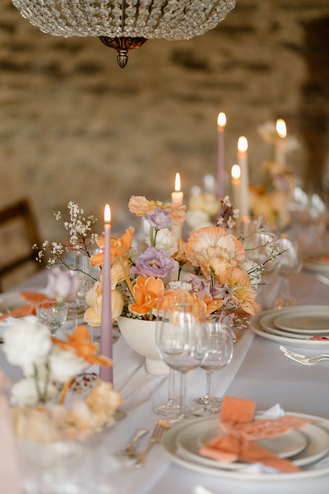 White bowl wedding table centrepiece with lilac and peach wedding flowers with peach and lavender candles decorating the tablescape | wedding table decor | wedding flowers | Kirsty Louise Photo Wedding Theme Lilac, Wedding Table Candles And Flowers, Purple And White Wedding Decor, Mauve Peach Wedding, Rust And Lilac Wedding, Lilac Wedding Inspiration, Terracotta And Lavender Wedding, White And Purple Wedding Flowers, Peach Table Decor