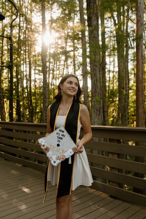 Senior Picture Ideas Boardwalk, Outdoor Grad Photos, Graduation Pose Ideas Grad Pictures, Ucf Grad Pics, Park Graduation Pictures, Graduation Pictures Ucf, Ucf Grad Photos, Forest Graduation Pictures, Graduation Pictures Nature