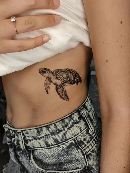 Turtle Tattoo Turtle Rib Tattoo, Big Thigh Tattoos, Small Animal Tattoo Ideas, Small Animal Tattoo, Cute Turtle Tattoo, Small Turtle Tattoo, Small Tattoo Ideas For Men, Tortoise Tattoo, Crocodile Tattoo