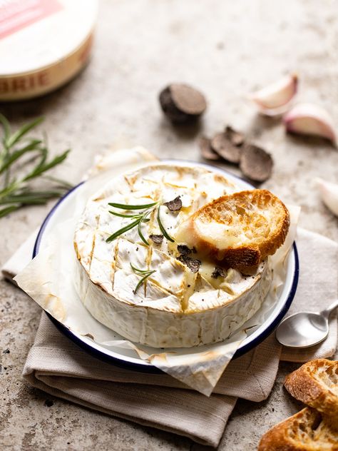 Easy baked Brie with truffle and garlic | Ile de France Cheese Boil Asparagus, Easy Baked Brie, Asparagus Pizza, Choux Pastry, Rosemary Sprigs, Truffle Oil, Brie Cheese, Garlic Clove, Baked Brie