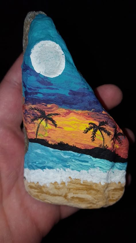 Ocean sunset with Moon already up and palm tree silhouettes free hand painted rock Palm Tree Silhouette Painting, Sunset With Moon, Beach Rock Art, Nautical Crafts, Palm Tree Silhouette, Seashell Painting, Painted Rocks Kids, Sailboat Painting, Christmas Rock