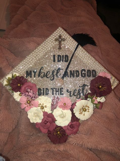 Graduation cap with glitter, pearl border, a cross, and flowers with the quote “I did my best and God did the rest” Cross Graduation Cap, God Cap Decoration Graduation, Cap Decoration Graduation God, Jesus Graduation Cap, Graduation Cap Christian, Graduation Cap Designs God, God Graduation Cap Ideas, Christian Graduation Cap Ideas, Graduation Bible Verses