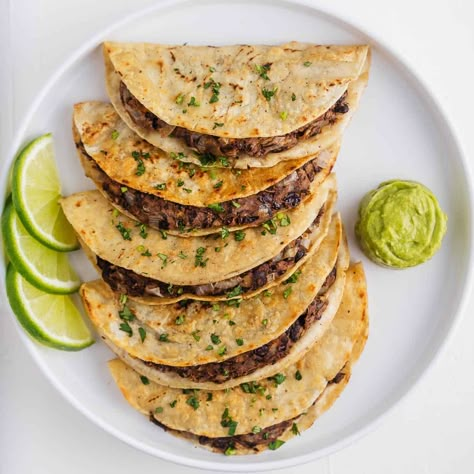 Crispy corn tortillas surround a soft, perfectly-seasoned black bean filling. These tacos are super easy to make and taste even better with a drizzle of avocado cream sauce. Crispy Black Bean Tacos, Crispy Black Bean, Avocado Cream Sauce, Corn Tortilla Recipes, Authentic Mexican Recipes, Homemade Corn Tortillas, Creamy Avocado Sauce, Crispy Tacos, Black Bean Tacos