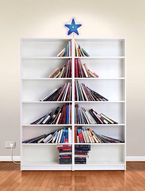 Love this Christmas Tree bookshelf. Anyone know who the photographer is? Lots Of Books, Ikea Christmas, Book Christmas Tree, Book Tree, Alternative Christmas, Creative Christmas Trees, Alternative Christmas Tree, Unique Christmas Trees, Christmas Ad