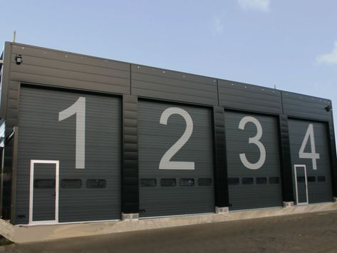 Industrial Garage Door, Warehouse Architecture, Sectional Garage Doors, Industrial Door, Door Number, Bus Terminal, Warehouse Storage, Door Numbers, Automatic Door