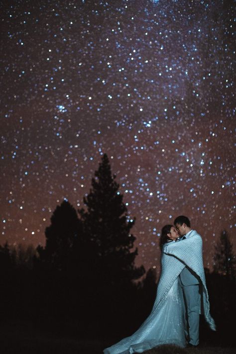 Starry night photoshoot in NZ Queenstown Starry Night Engagement Photos, Starry Photoshoot, Stars At Night Photography, Couple Laying Under The Stars, Winter Wedding Night Photography, Milky Way Photography, Night Time Wedding, Queenstown New Zealand, Prewedding Photography