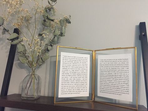 Wedding vows in gold glass frame set with wedding flowers in master bedroom  #sentimental #homedecor #weddingvows #vows #goldframe #weddingflowers Wedding Picture Canvas Display, Display Vows At Wedding, Wedding Vows As Decor, Wedding Vow Home Decor, Wedding Album Display In Home, Displaying Wedding Photos In Bedroom, Vows Gift Ideas, Vows In Bedroom, Vows Display Ideas