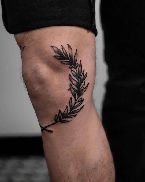 Cool Leg Tats For Men, Knee Branch Tattoo, Olive Branch Tattoo Mens Knee, Flower Knee Tattoo Men, Around Knee Tattoo Men, Greek Leaves Tattoo Knee, Laurel Knee Tattoo, Knee Tattoo Men Ideas, Under Knee Tattoo Men