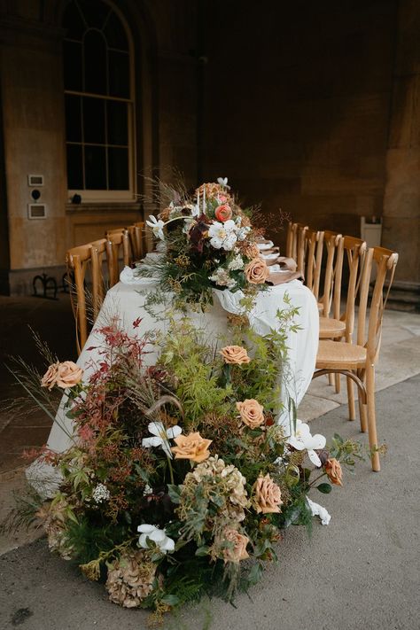 End of the table floral arrangement with natural green grasses and fresh and dried flowers Wedding Flower Arrangements Ideas, Botanical Wedding Dress, Botanical Wedding Flowers, Botanical Wedding Table, Botanical Wedding Decor, Flower Arrangements Ideas, Botanical Wedding Theme, Botanical Wedding Inspiration, Table Floral Arrangements