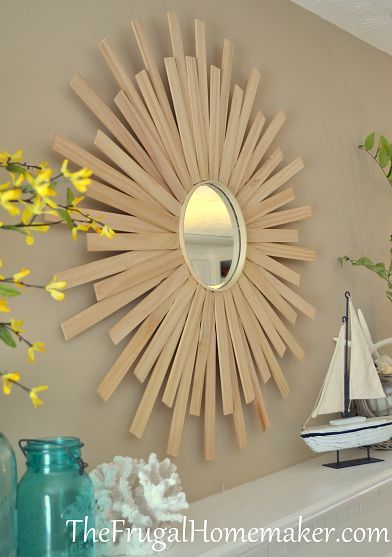 DIY Sunburst Mirror:This mirror is made using the paint sticks or cedar shims,a mirror and an embroidery ring.This looks easy. Stirrers Diy, Sun Burst Mirror, Diy Sunburst Mirror, Sunflower Tutorial, Cheap Mirrors, Clothespin Wreath, Fancy Mirrors, Diy Summer Crafts, Starburst Mirror