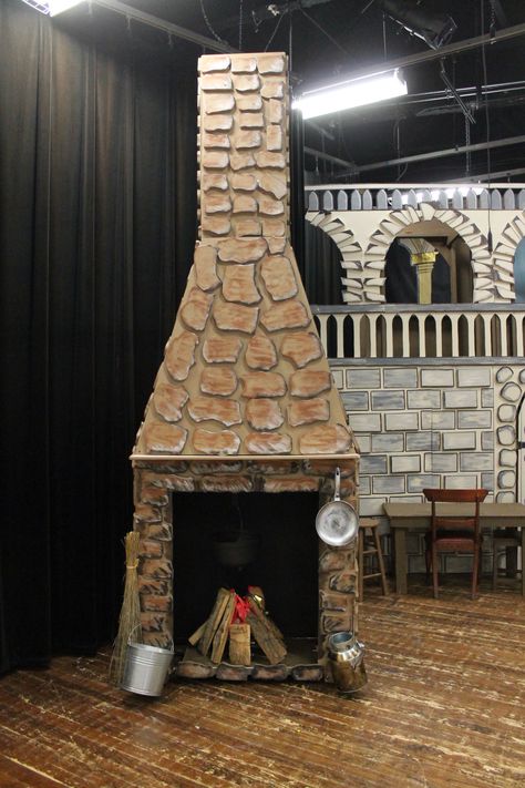 Fireplace made out of wood and covered in foam for detail Stage Fireplace, Fireplace Set Design Theatre, Fireplace Backdrop, Castle Fireplace, Castle Stage Design, Christmas Cabin Decor, Wood Props, Theatre Backdrops, Sleeping Beauty Ballet