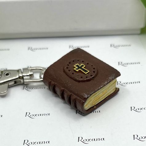 Miniature Bible, Polymer Clay Book, Handmade Pretend Bible, Dollhouse Book, Tiny Holy Bible, Sacred Scripture, Christian Bible- Detailed Realistic Looking Pages- Great Gift- Handmade By Me. I Enjoy Making Miniature Books And Making Jewelry With My Polymer Clay. - Book Measure: (1"X 3/4"X 1/2") Stainless Steel Metal Attachments- Can Be Attach To Anything You Like, Like A Necklace, Book Mark, Zipper Bag, Bag Charm, Car Charm, Etc. - Great Gift For Book Lovers, Writer, Mom, Teacher, Sibling, Cowork Christian Gifts Diy, Clay Book, Polymer Clay Books, Sculpting Ideas, Necklace Clay, Book Handmade, Dollhouse Books, Clay Keychain, Clay Sculpting