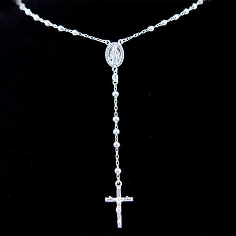 Dimensions: L 13.5" Approximate Weight: 16g Description: This exquisite rosary from the Holy Land is made from 925 sterling silver. The centerpiece for this gorgeous Bethlehem Rosary portrays Our Mother the Holy Virgin! It is a constant reminder of the serenity of the Holy Spirit, and the importance of praying to Virgin Mary who is always watching over us. This rosary can be used personally, but it also works perfectly as a first communion gift. A gift that they could use well into adulthood. “H Estilo Cholo, First Communion Gifts, Rosary Necklace, Chains Necklaces, Christian Cross, Miraculous Medal, Classy Jewelry, Jewelry Lookbook, Chain Ring