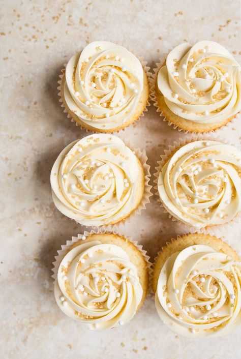 Wedding cake cupcakes for two--for your anniversary--with perfect white buttercream roses. Almond Wedding Cake Cupcakes, Almond Wedding Cake, Cupcakes Icing, Small Batch Cupcakes, Wedding Cake Cupcakes, Almond Wedding Cakes, Anniversary Dessert, 4 Cupcakes, Mini Wedding Cakes