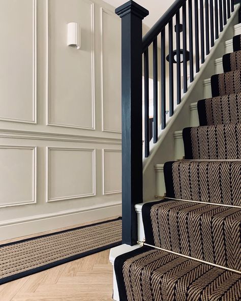 Panelled hallway with a herringbone jute runner. Painted in School House White and Off Black by @farrowball Design by @home.style.interior Lambriseringen Gang, Stairs And Hallway Ideas, Black And White Stairs, Victorian Hall, Stair Paneling, White Hallway, Victorian Hallway, Black Stairs, Painted Staircases