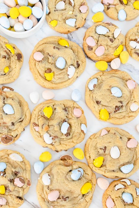 Cadbury Egg Cookies are a fun spin on a traditional Chocolate Chip Cookie Recipe made with chopped Cadbury Mini Eggs. This small batch recipe is a fun Easter Cookie Recipe that is soft and chewy. #devourdinner #cookies #bestcookierecipes #easycookies #eastercookies #cadburyminieggs #cadburycookies #cadburyeggcookies #easydesserts #recipeoftheday #yum #yummy Cadbury Mini Egg Recipes, Cadbury Egg Cookies, Mini Egg Recipes, Cadbury Cookies, Cadbury Mini Egg Cookies, Mini Egg Cookies, Cadbury Mini Eggs, Mini Eggs Cookies, Easter Cookie Recipes