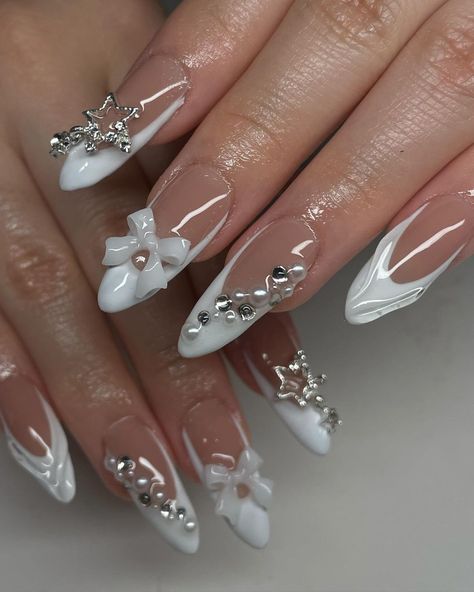 Ciena Yang | Frenchies, bows, pearls, stars… who doesn’t want a set like this?? 😩😚🤍 - - - #gelxnails #gelx #mnnailtech #minnesota #nailinspo #nails… | Instagram Nails With White Stars, White Nails Aesthetic, White Almond Nails, Tattoos Inspo, White French Tip, Nails Aesthetic, French Nail Designs, Snowflake Nails, Almond Nail