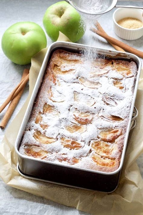 This simple Dorset Apple Cake (Traybake) made with cooking apples (Bramley) and gently spiced with cinnamon is incredibly moist & delicious. Perfect on its own with cup of tea or slightly warm with ice cream or cream for dessert. #dorsetapplecake #bramleyapples #applecake #cinnamon #appledessert Recipes Using Cooking Apples, Apple Tray Bake Recipe, Apple Traybake Recipes, Bramley Apple Cake, Dorset Apple Cake, Eating Apple Recipes, Dorset Apple Cake Recipe, Cake Tray Bakes, Bramley Apple Recipe