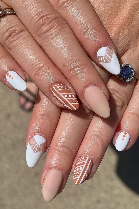 Embrace the artistry of boho nails with these 22 mesmerizing geometric wonders! From intricate patterns to vibrant colors, these designs will elevate your nail game to a whole new level. Get inspired and let your creativity shine! Bobo Nail Art, Bridal Nails Wedding Boho, Boho Manicure Ideas, Boho Toe Nail Designs, Simple Aztec Nail Designs, Beach Boho Nails, Sedona Inspired Nails, Western Inspo Nails, Nail Designs Cactus