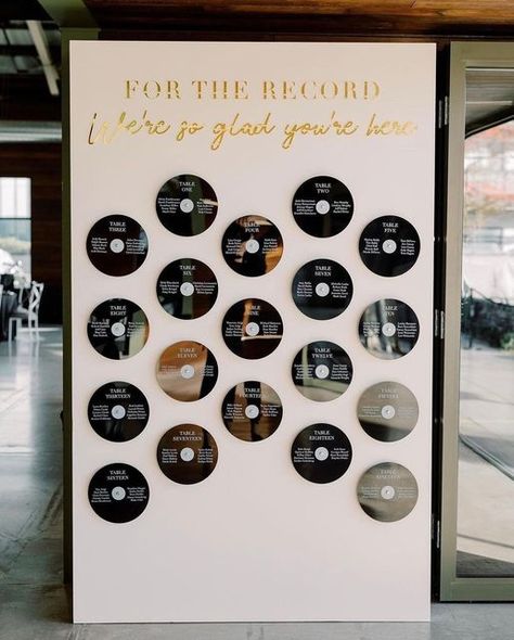 Record Wall Wedding, Unique Wedding Diy, Disco Seating Chart Wedding, Boho Disco Wedding Centerpieces, Old English Wedding Theme, Music Venue Wedding, Party Booth Ideas, Record Seating Chart Wedding, Table Seating Chart Ideas