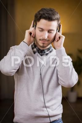 Attractive young man listening to music on headphones, eyes closed Stock Photos #AD ,#listening#music#man#Attractive Finger On Lips, Man Listening To Music, Music Headphones, It's A Secret, Eyes Closed, Photoshop Brushes, Model Release, Listening To Music, Hush Hush