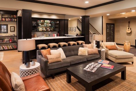 I like the setup of this—seating area in front of the bar so everyone is still in line with the tv. Transitional Basement, Rustic Basement Bar, Basement Paint, Woodworking Quotes, Basement Bars, Basement Finish, Rustic Basement, House Basement, Basement Office