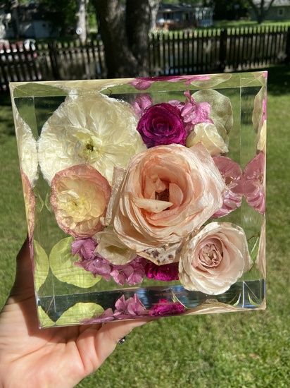 Don't throw away your special wedding flowers, I can save them forever for you! I offer custom flower preservation services in crystal clear epoxy resin keepsakes. I accept flowers from all over the USA! Booking spots for 2022 & 2023.  I carefully dry or press your flowers to create everlasting heirloom artwork and home decor. Wide variety of shapes and sizes available for all budgets. Make sure to save your spot, limited availability. ... Wedding Flowers In Resin, Flowers In Resin, Crystal Clear Epoxy Resin, Flower Preservation, Wedding Planning Tools, Free Wedding Printables, Bouquet Preservation, Custom Bouquet, Clear Epoxy Resin