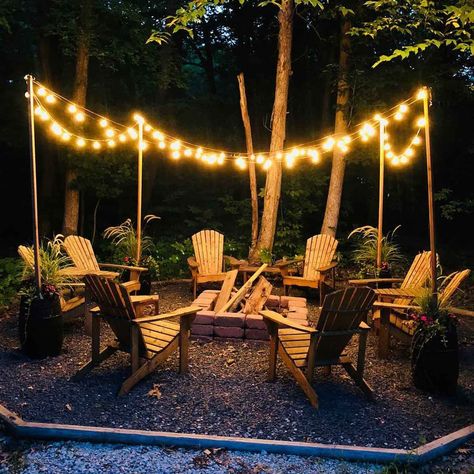 12 Outdoor Fire Pit Lighting Ideas | The Family Handyman Fire Pit Lighting Ideas, Outdoor Fire Pit Area, Bonfire Pits, Fire Pit Lighting, Cedar Posts, Diy String Lights, Fire Pit Landscaping, Patio Fire Pit, Fire Pit Area