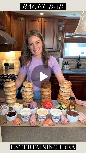 Tara Panasiuk on Instagram: "BAGEL BAR TIME 🥯😍 Save this for Mother’s Day or a fun brunch gathering! Comment “BAGEL” to be sent the items used for this set up 🩷 Also rounded up in stories and my LTK 🥰  Roll out some butcher paper and set out your bagels using these cute stands. Display all of your topping options around for your guests to dive in and customize their bagel 🤗 I love how you can write directly on the paper for labeling anything you need to. Perfect for spring and summer entertaining!☀️  #brunchideas #mothersday #easyfood" Nurses Week Breakfast Ideas, Bagel Brunch Ideas, Bagel Party Ideas, Diy Bagel Stand, Bagel Station Brunch, Bagel Board Ideas, Build Your Own Bagel Bar, Baby Shower Bagel Bar, Bagel Board Brunch