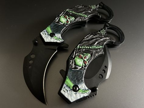 *7" Green Skull Grim Reaper Tactical Claw Karambit Assisted Open Folding Pocket Knife. *Handle Detail: 4.5" ABS Plastic Handle with 3D Green Grim Reaper Skull. *Blade Detail: 2.5" Stainless Steel Karambit Blade. *Overall: 7" Spring Assisted Open Blade Folding Pocket Knife with Glass Breaker. *Welcome to Visit Our Etsy Store for More Pocket Knife Gift: https://www.etsy.com/shop/BladeDeals *Feedback, Disclaimer & Age Restrictions: Request to all the buyers, we strive for positive Feedback on all transactions. Your satisfaction is very important to us, if you experience a problem of any kind with your purchase please contact us first before leaving any feedback or opening any claims, any issues will be resolved more efficiently if you contact us first and deal directly with us. We do stand be Knife Aesthetic, Tactical Swords, Butterfly Knife, Knife Gifts, Pretty Knives, Dagger Knife, Folding Pocket Knife, Knife Collection, Cool Swords