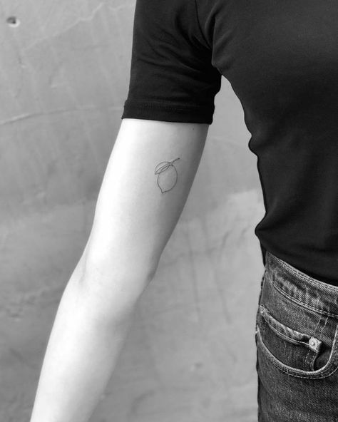 One line lemon tattoo on the inner arm. Lemon Tattoo Ideas, Italian Lemon Tattoo, Dainty Lemon Tattoo, Mango Tattoo Minimalist, Lemon Arm Tattoo, Lemon Small Tattoo, Lemon Tattoo Design, Simple Lemon Tattoo, Lemon Tree Tattoo Minimalist