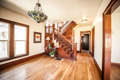 Wood Trim Ideas, Craftsman Living Rooms, Stained Wood Trim, Victorian Staircase, Dark Wood Trim, House Rehab, Stained Trim, Doors And Trim, Light Floors