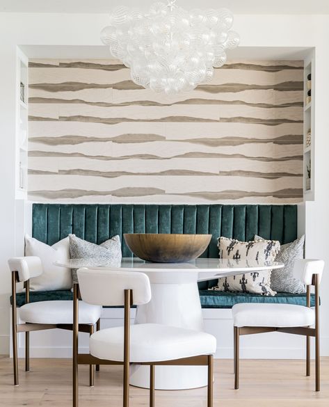 Breakfast nook goals! We used emerald green to create an inviting custom upholstered banquette seat that provides additional seating and a bold focal point. 😍 Restaurant Booth Seating Dining Room, Counter Height Banquette Seating, Modern Home Bar Designs Small Spaces, Booth Seating Dining Room, Oasis Interior Design, Booth Seating Design, Upholstered Banquette Seating, Oasis Interior, Breakfast Banquette