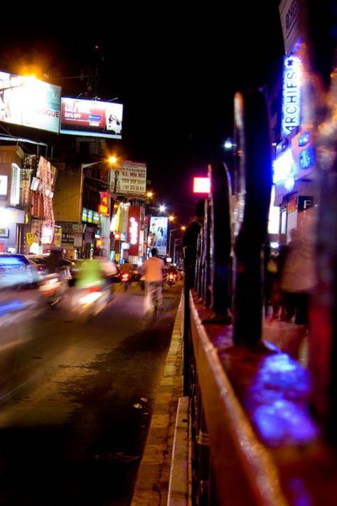 This is one of the busiest roads in Bangalore and is often considered the hub of the city. Here, you can find everything from traditional shops to busy malls (especially on Brigade Road) and a plethora of restaurants, cafes, and pubs (found on Church Street). MG Road is the one place for all your needs! Originally known as South Parade, it was renamed Mahatma Gandhi Road in 1948. The city may not be known for its tourist spots, but there are still many fascinating things to do in Bangalore. Mg Road Bangalore Snap, Church Street Bangalore, Mg Road Bangalore, Bandra Mumbai, Bangalore City, Garden City, Tourist Spots, Aesthetic Guys, Mahatma Gandhi