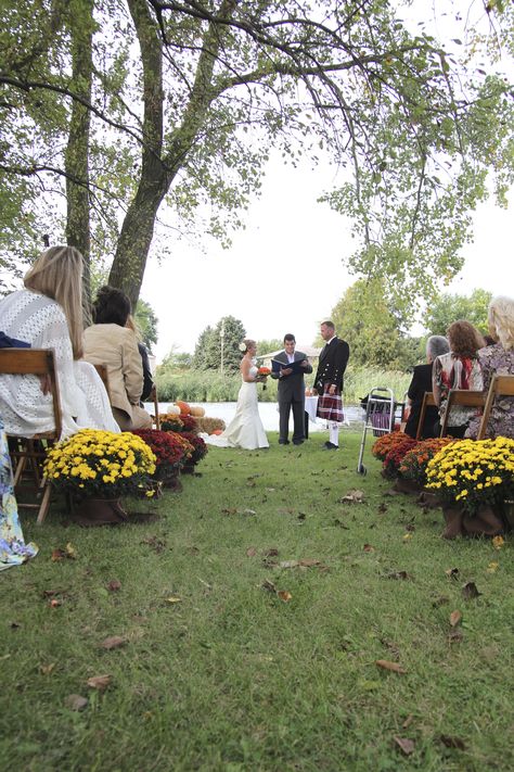 Mums lining the aisle is so simple for a fall wedding! Mums In Wedding Decor, Mums Aisle Wedding, Mum Aisle Decor, Weddings With Mums, Mums Wedding Aisle, Mums At Wedding, Fall Wedding Walkway Aisle Decorations, Mums Down Wedding Aisle, Fall Wedding Mums