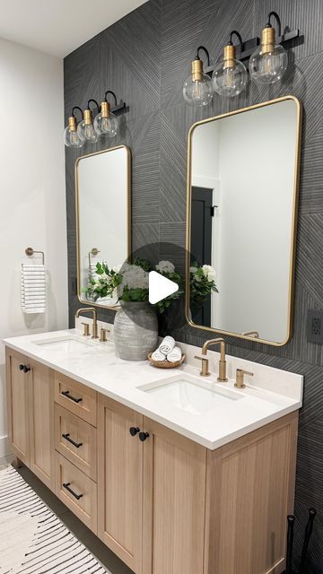 Karey + Justin | Home Build | Home Design | Home Life on Instagram: "First peak at our basement bathroom.  We went for a modern take with neutral colors. Glass shower door on order. Stay tuned for that!  Who else is obsessed with the charcoal tile wall? 🙋🏻‍♀️ We wanted a little moody but not too dark since there is no natural light.   Tile: by @tilebar (Enso, Kenridge, and Portmore). Vanity: by @teodorvanities  Paint: SW pure white Floor: concrete with overlay  Comment LINK for details to be sent your way.  Must be following for links to be sent correctly.   #modernfarmhouse #interiordesign #moderntransitionaldesign #customhome #buildtips #newbuild #homedecor #basementbathroom #neutralbathroom #woodlooktile #blackwalltile #portmore #kenridge #enso #tilebar #whiteoakvanity" Bathroom Dark Walls Light Floor, Modern Bathroom Dark Floor, Light Floor Dark Walls Bathroom, Bathroom With Brick Accent Wall, Bathroom Dark Floors Light Walls, Charcoal Accent Wall Bathroom, Charcoal Wall Bathroom, Black Tile Behind Vanity, Moody Ensuite Bathroom Ideas