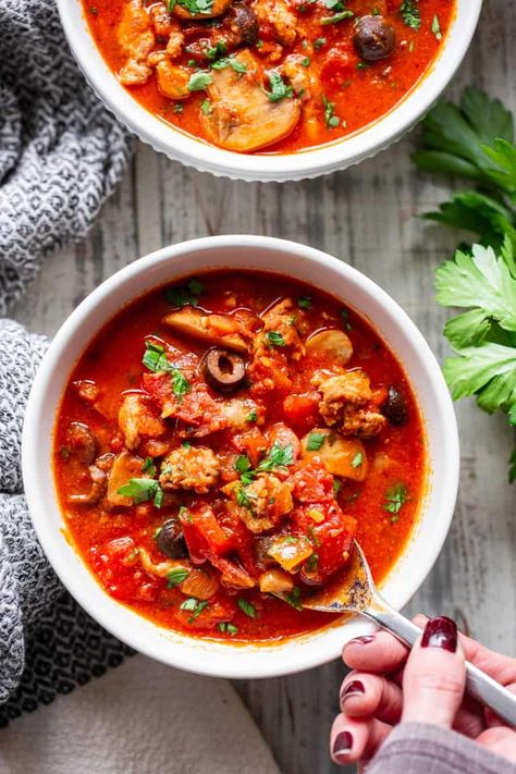 This low carb and paleo pizza soup is hearty, comforting and packed with all your favorite pizza toppings like sausage, peppers, onions, mushrooms, olives and pepperoni. Add broth and your favorite marinara sauce and you have a healthy meal that tastes just like pizza but without the carbs and dairy! #whole30 #paleo #keto #cleaneating Sausage Peppers Onions, Paleo Soups, Pizza Soup, Bacon Cheeseburger Soup, Paleo Pizza, Easy Whole 30 Recipes, Paleo Soup, Whole30 Keto, Low Carb Veggies