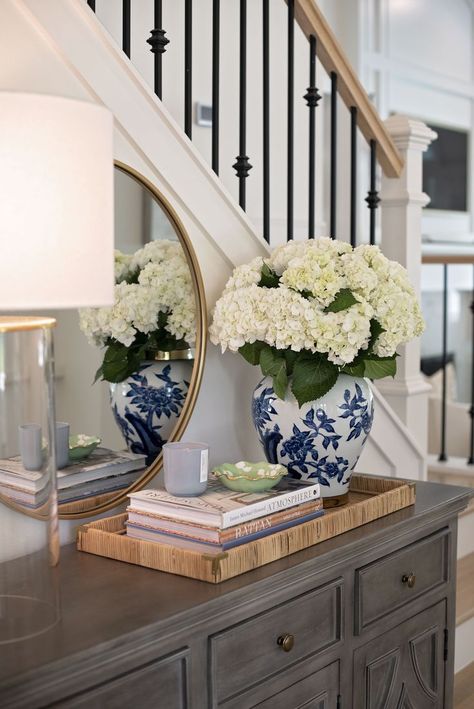 https://pin.it/3uzBRjHJK Chinoiserie Entry Table, Console Tray Decor, Console Table Next To Stairs, Chinoiserie Farmhouse Decor, White And Blue Vase Decor, How To Add Seating In Small Living Room, Grand Millenial Foyer, Living Room Off Entryway, Chinoiserie Vase Decor