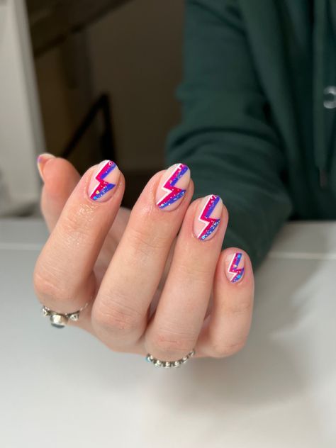 nail inspo, nail designs, acrylics, nail ideas, trendy nail art, nail art, edgy nails, nail instagram story idea, nail picture, short nail designs, lightning bolt nails, colorful nail designs, pink nails, pink nail design, purple nail designs, freestyle nails, sparkly nails, short pink nails, rock n roll nail art, round nails, round nail inspo, almond nail designs, sparkle nails, glitter nail ideas, edgy nail design, edgy nail art, ethereal nail, fairy nails Edgy Nail Designs Short, Rock Band Nail Designs, Purple Nails With Lightning Bolt, Lightning Nails Short, Rock N Roll Nail Art, Edgy Purple Nails, Rock Music Nails, Nails For Rock Concert, Fun Concert Nails