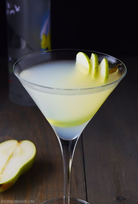 Pear and Elderflower Martini Recipe SERVES: 1   2 OUNCES PEAR VODKA ½ OUNCE ELDERFLOWER LIQUEUR 1 OUNCE LEMON JUICE 1 OUNCE SIMPLE SYRUP SLICED PEAR (FOR GARNISH) Pear Martini Recipe, Elderflower Martini, Pear Martini, Pear Vodka, Liqueurs Recipes, Martini Recipe, Martini Recipes, Exotic Food, Easy Cocktails